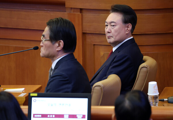 11일 서울 종로구 헌법재판소에서 열린 탄핵심판 7차 변론에 출석한 윤석열 대통령. 공동취재단